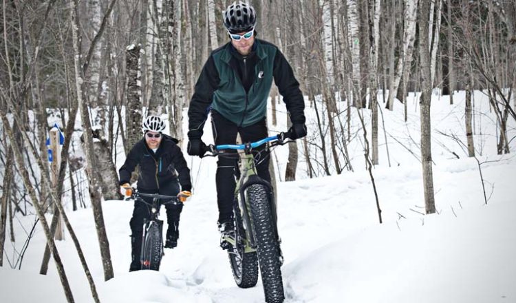 Snow bikers ride on a portion of the Noquemanon Trail Network in Marquette, MI on Monday, March 17, 2014. (Marquettemagazine photo by Ron Caspi)